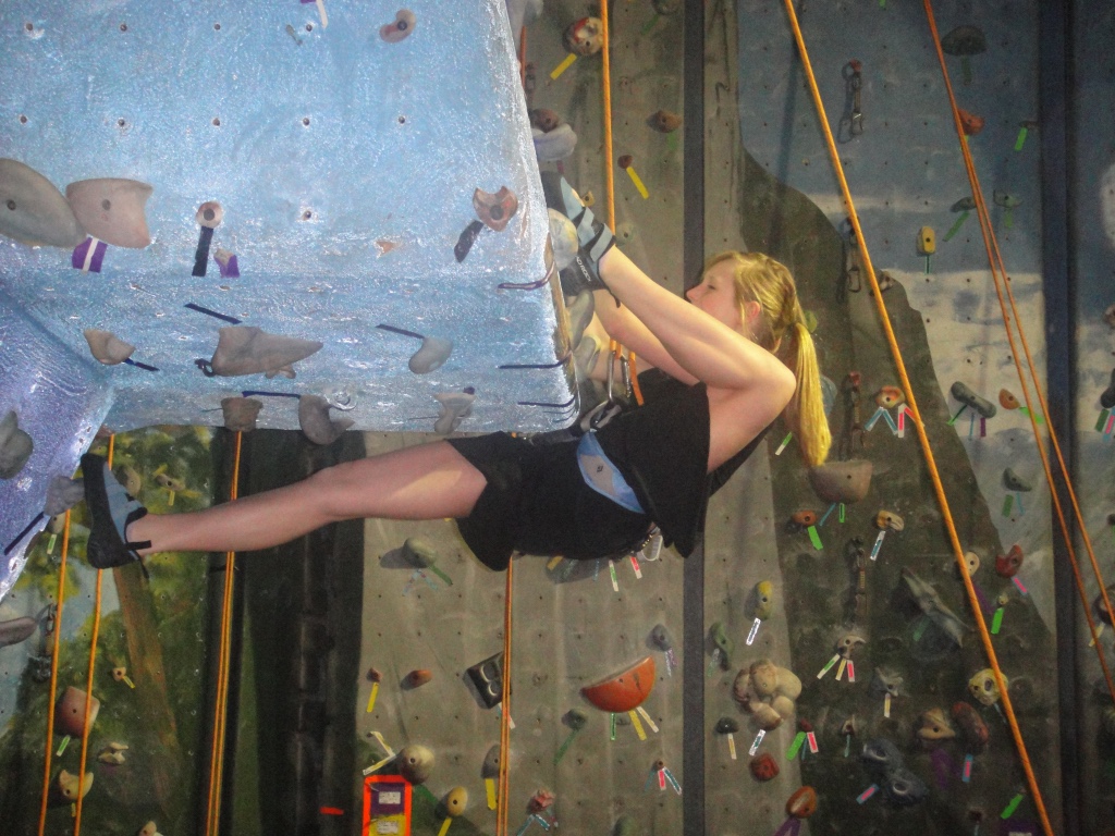 Girl rock climbing